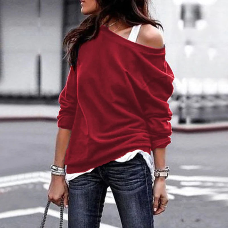 Voorkant rode lange en leuke trui voor dames